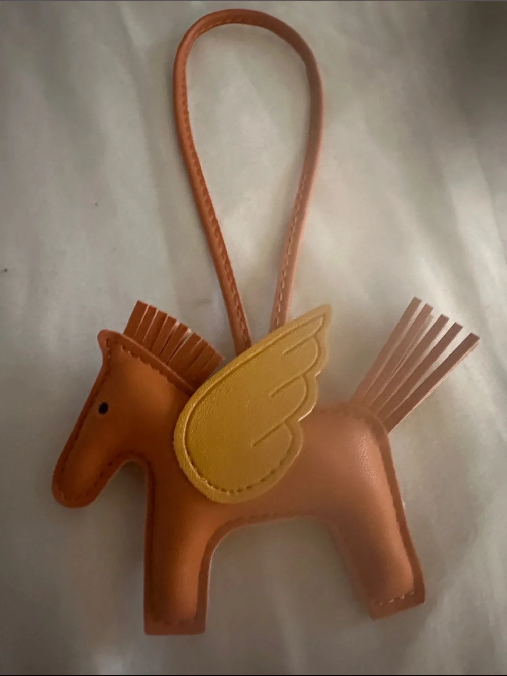 NWOT Orange Pegasus Bag Charm with Yellow Wing